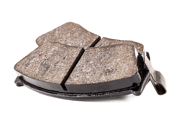 New brake pads on white background